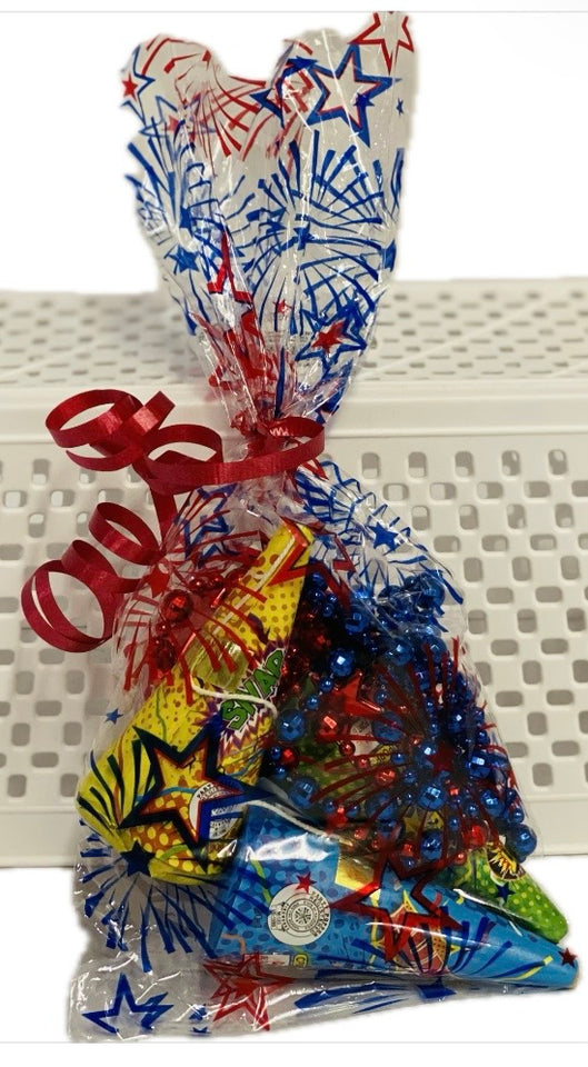 Colorful candy bag with star designs and a red ribbon on a white background