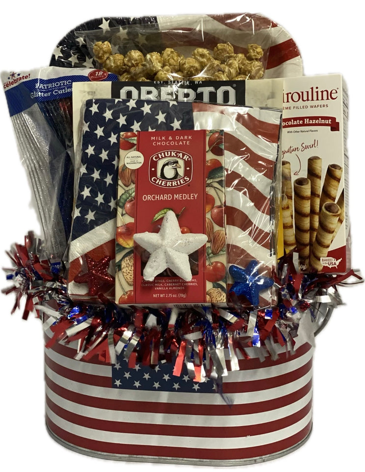 Gift basket with American flag design containing snacks and treats.
